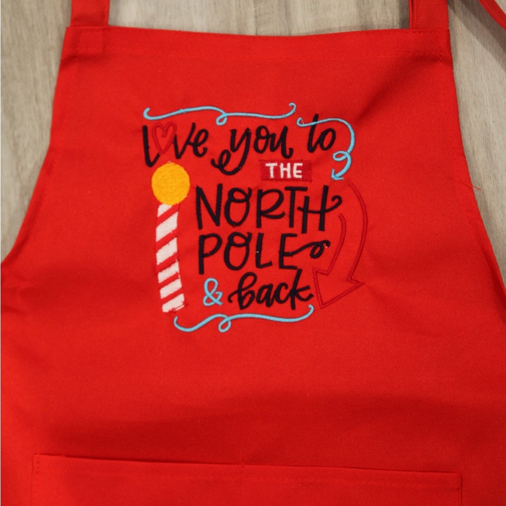 Kids Red Apron with North Pole Design